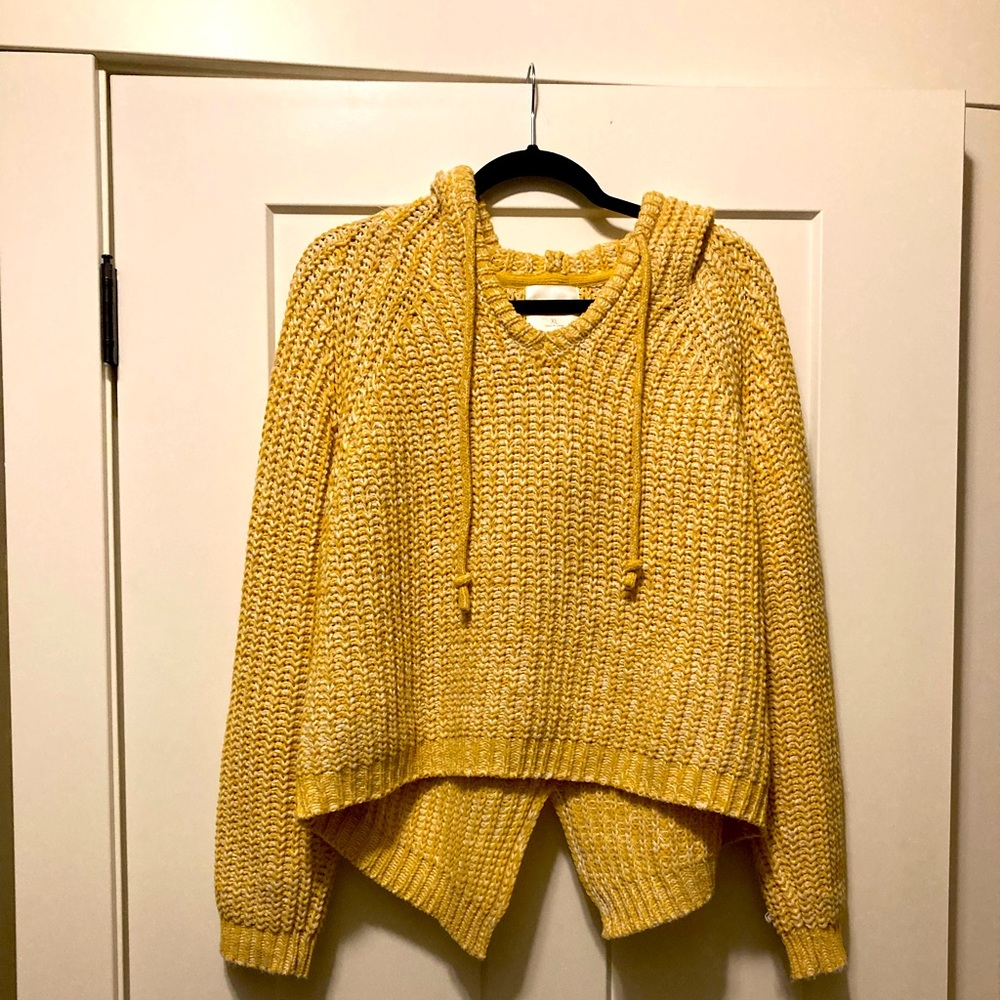 Cute women’s mustard-colored sweater with hood. Seldom worn.